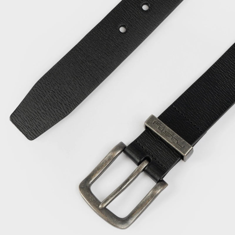 Black belt with metal buckle on a white background