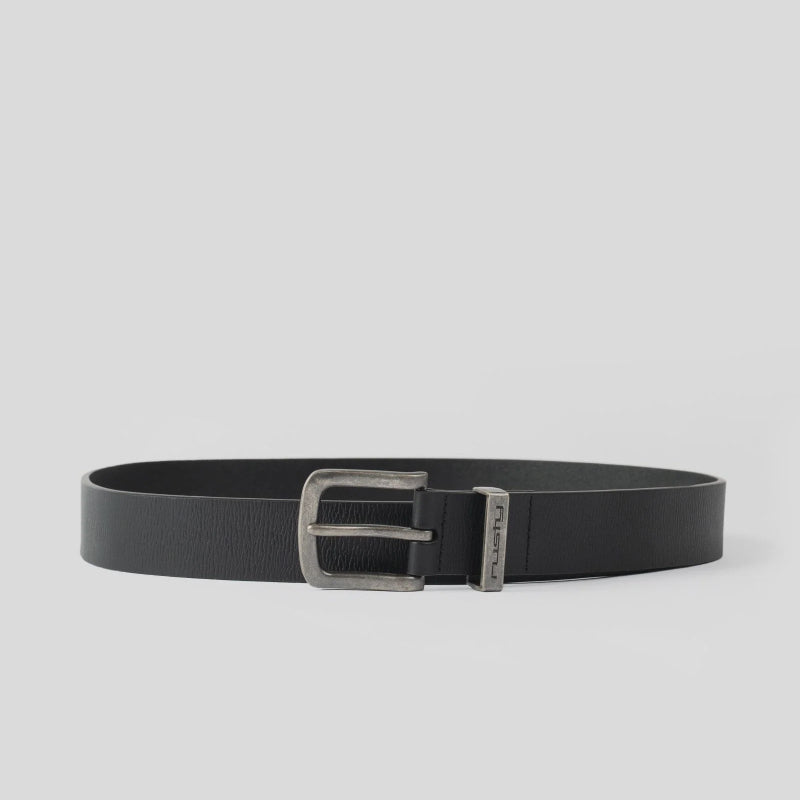 Black belt with a silver buckle on a light gray background