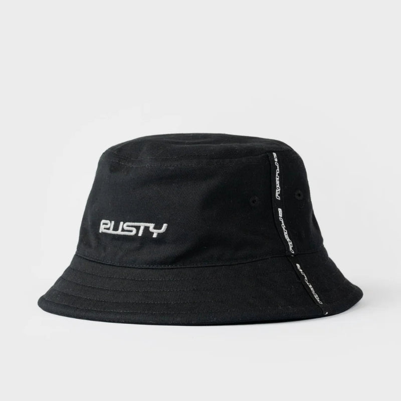 A black bucket hat with a white embroidered 'RUSTY' logo on the front, displayed against a light gray background.