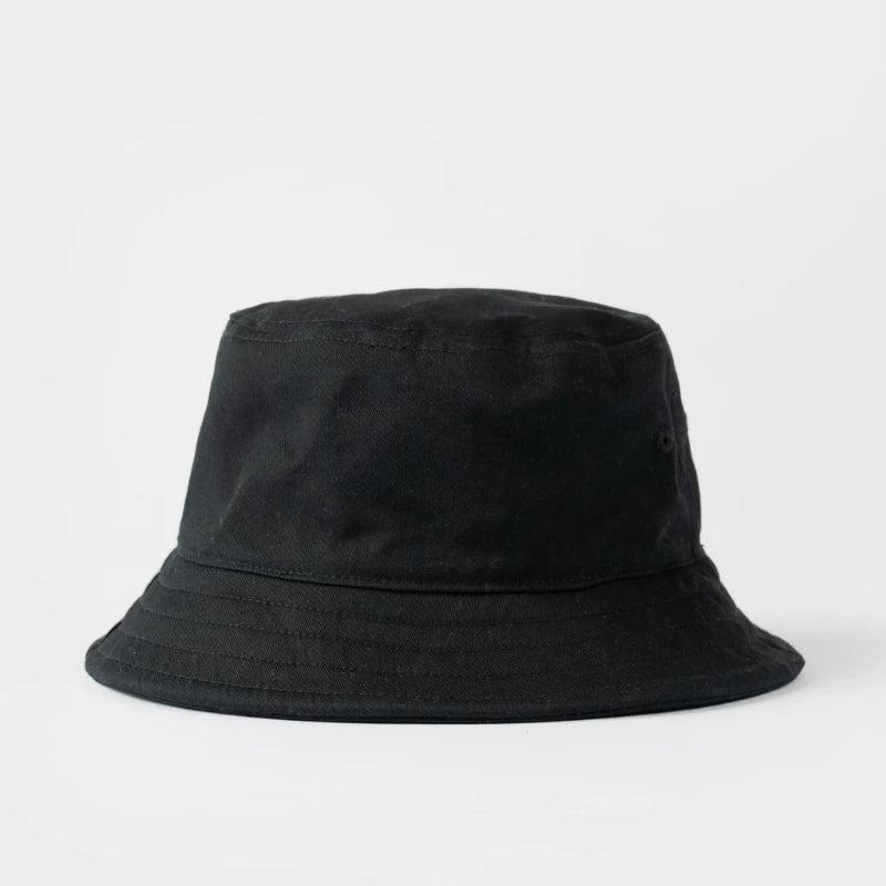 A black bucket hat made of canvas-like fabric, photographed from the front against a clean, light gray studio background.