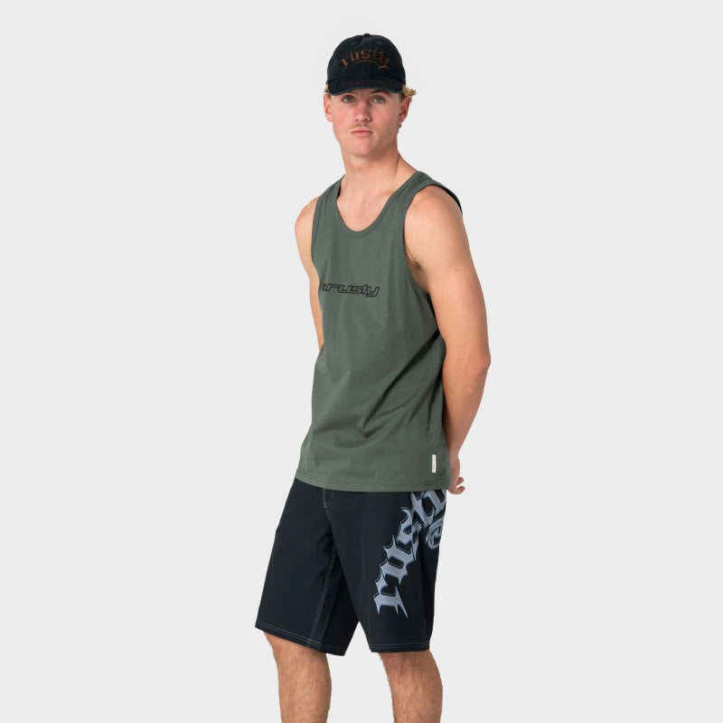 Man wearing a green tank top and black shorts with visible branding on a white background