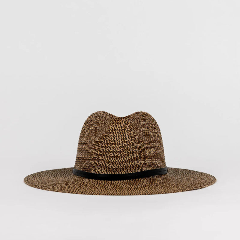 Brown straw hat with a wide brim on a light gray background
