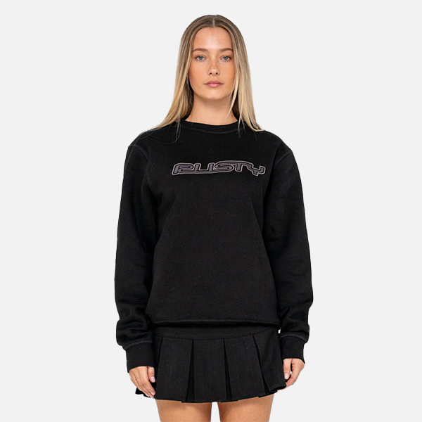Person wearing a black sweatshirt with RUSTY logo on a plain background