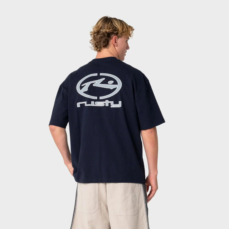 Person wearing a navy blue t-shirt with a logo on the back, standing against a white background