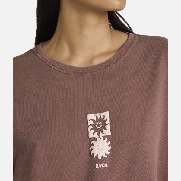 Brown t-shirt with sun design and 'RVCA' logo on a plain background