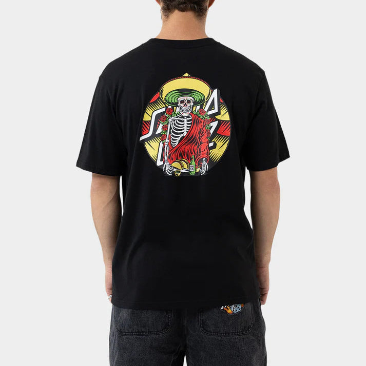 Person wearing a black t-shirt with a colorful graphic design on the back, standing against a white background.