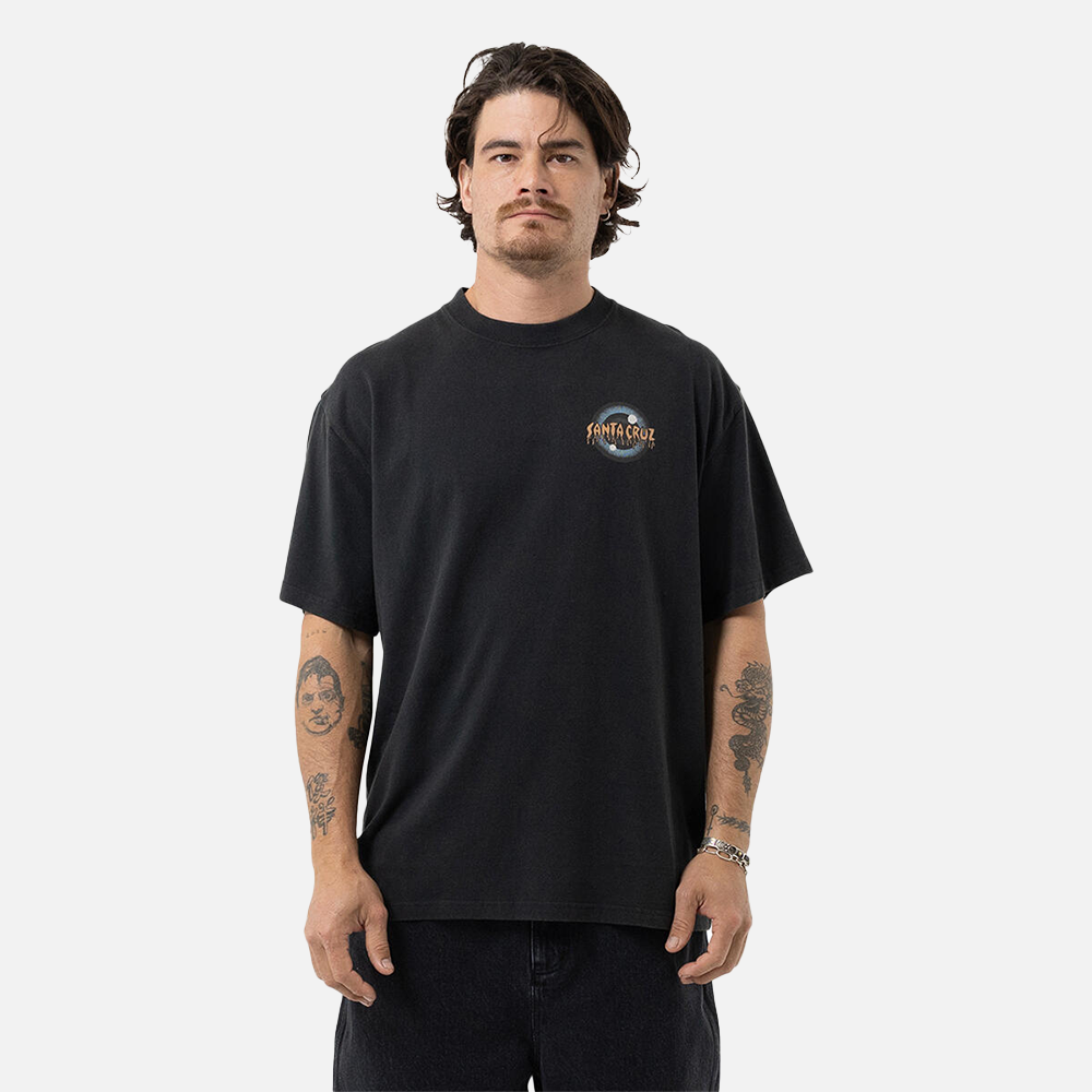 Man wearing a black t-shirt with a santa cruz logo on a white background