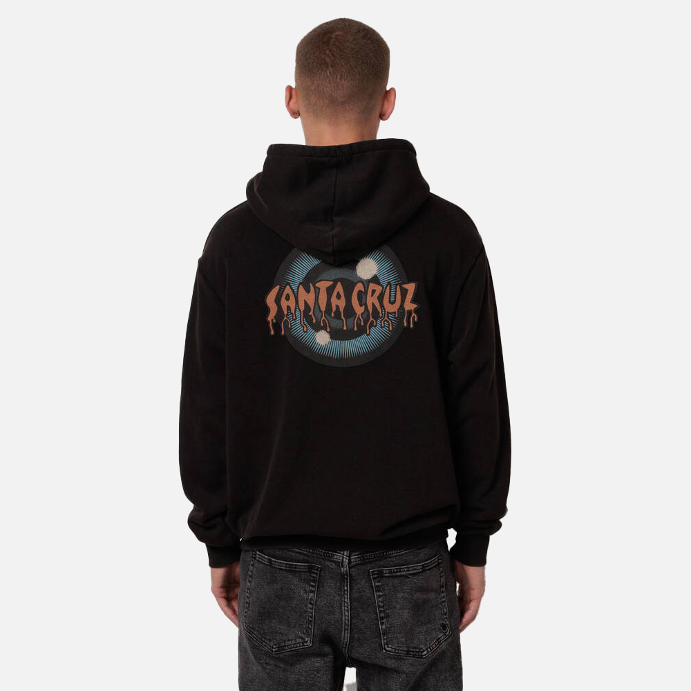 Person wearing a black hoodie with a Santa Cruz logo on the back against a white background