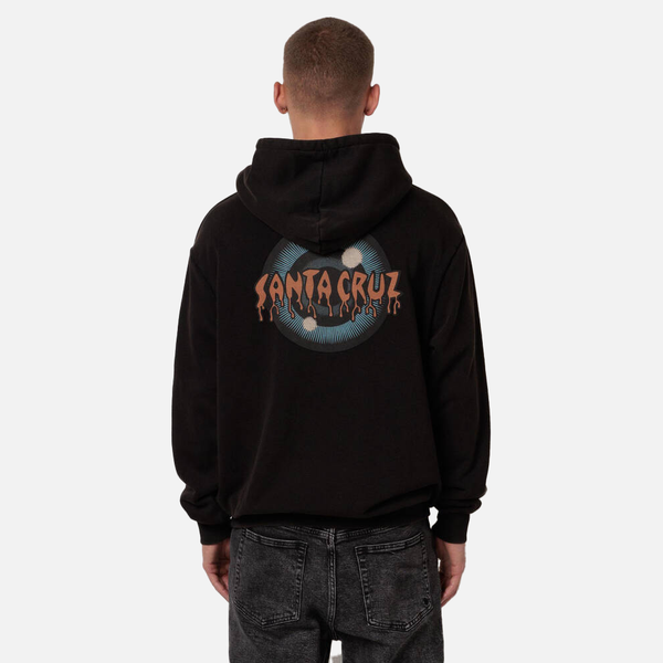 Person wearing a black hoodie with a Santa Cruz logo on the back against a white background