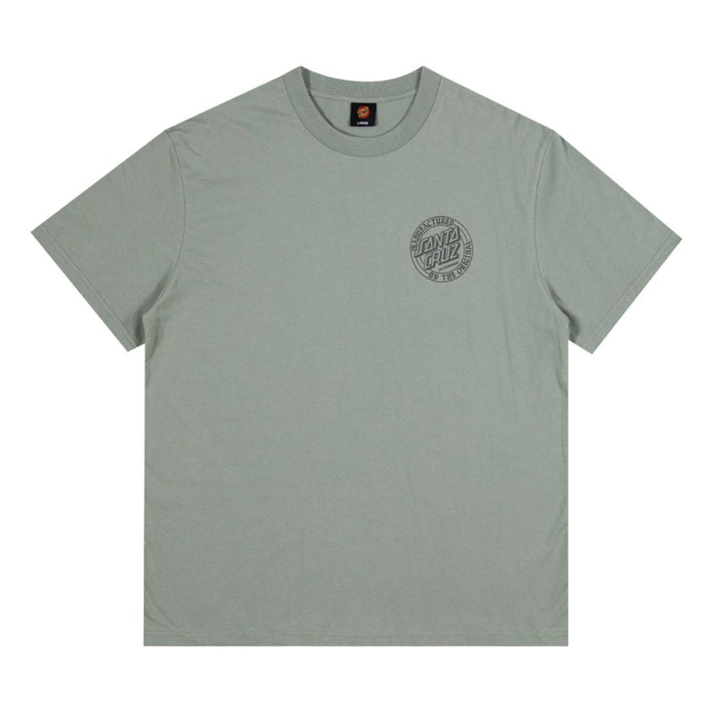 A sage green crewneck t-shirt with a circular gray graphic printed on the left chest, displayed flat against a solid white background.