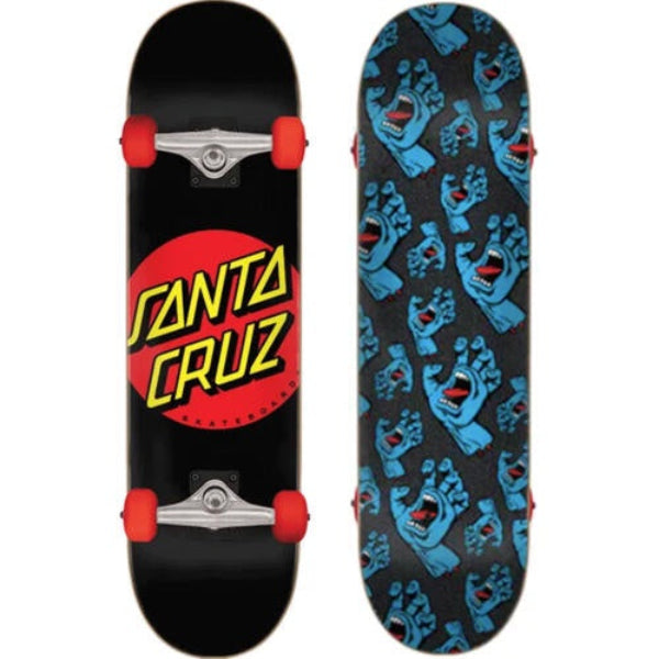 Santa Cruz skateboard shown from both sides: the black underside features the large red and yellow Santa Cruz logo, and the top deck has a repeating blue Grumpy Face grip-tape pattern on a black background.