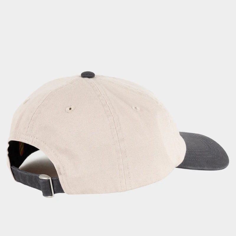 Beige cap with black brim on a light gray background
