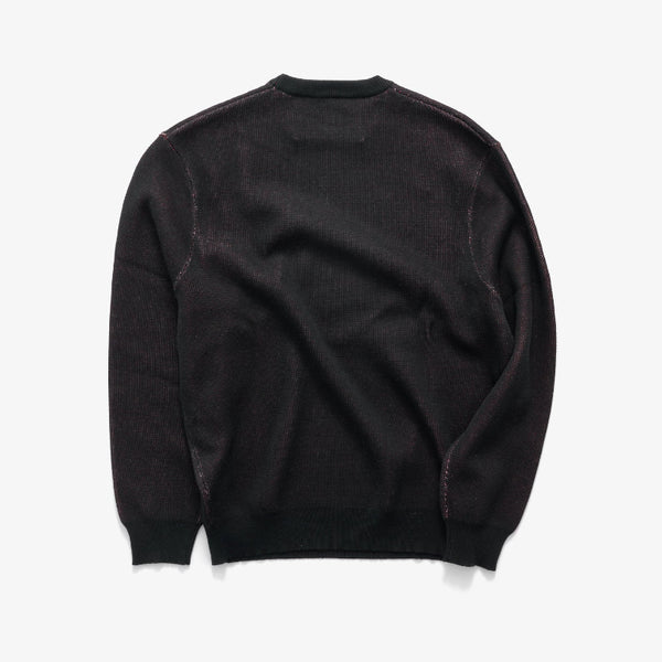 A black long-sleeve knit sweater shown from the back, laid flat against a clean white background.