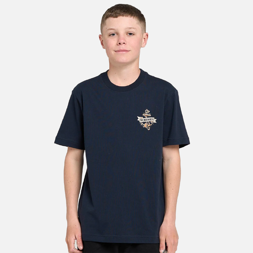 Young person wearing a navy blue t-shirt with a logo on a white background
