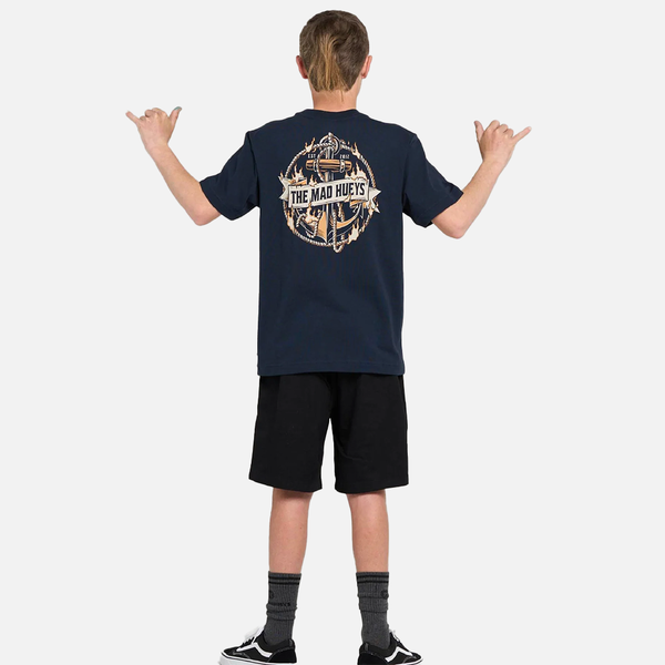 Person wearing a navy blue t-shirt with a graphic design on the back, standing against a white background.