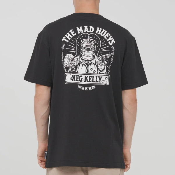 A man viewed from the back wearing a black t-shirt with a large white graphic print on the back. The graphic features a keg, a beer glass, and the text 'THE MAD HUEYS', 'KEG KELLY.