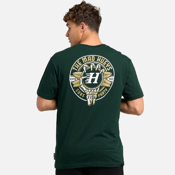 Person wearing a green t-shirt with a logo on the back against a white background