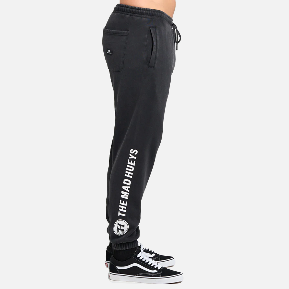 Black jogger pants with 'The Mad Hueys' branding on a white background