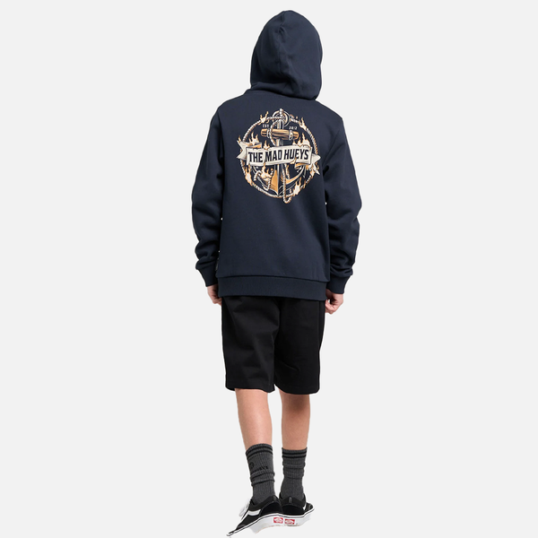 Person wearing a navy hoodie with a logo on the back, standing against a white background