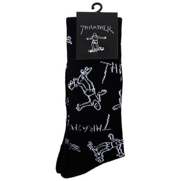 Black socks with white graphics and 'Thrasher' logo on a white background