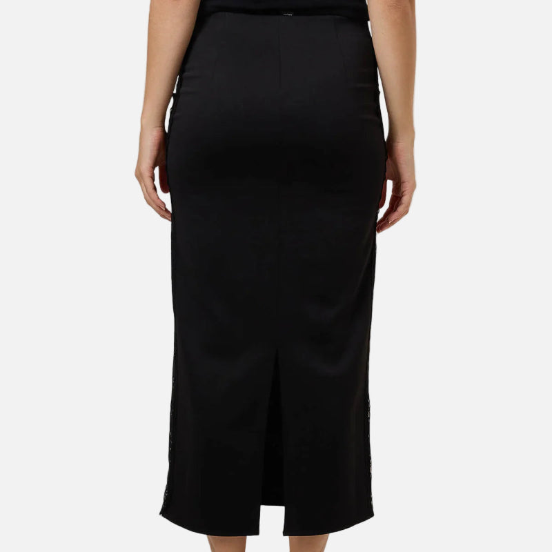 Person wearing a black skirt on a white background