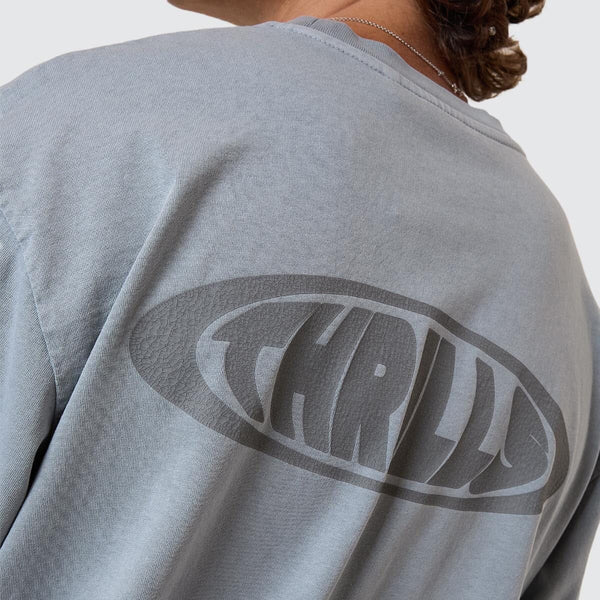 Gray t-shirt with a logo on the back against a white background