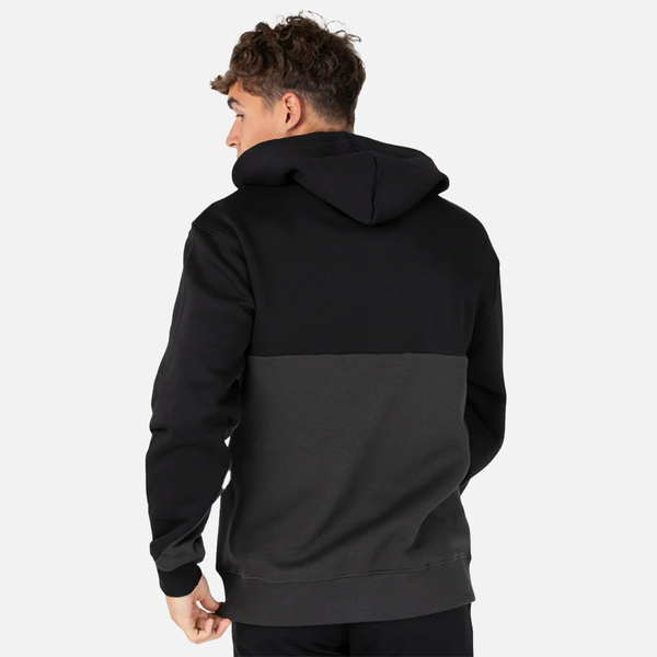 Person wearing a black and gray hoodie from behind on a white background