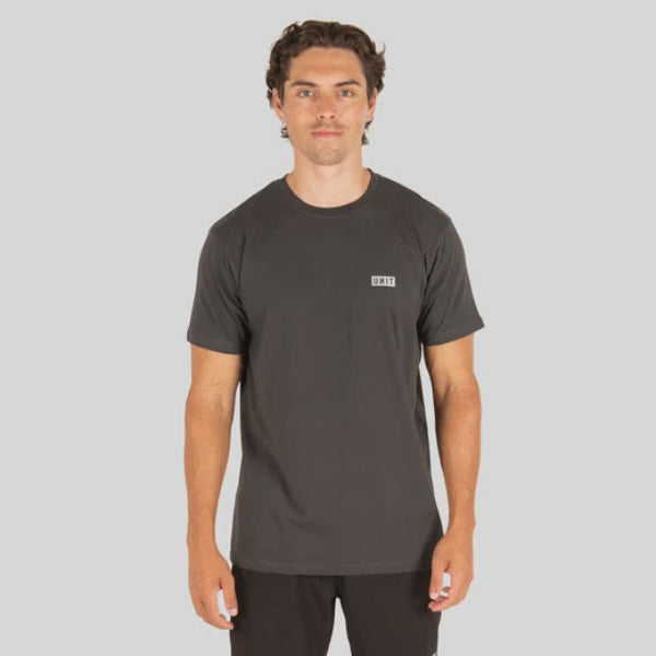 Man wearing a black t-shirt and black shorts on a white background