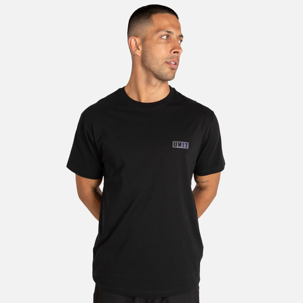 Man wearing a black t-shirt with a unit logo on a white background