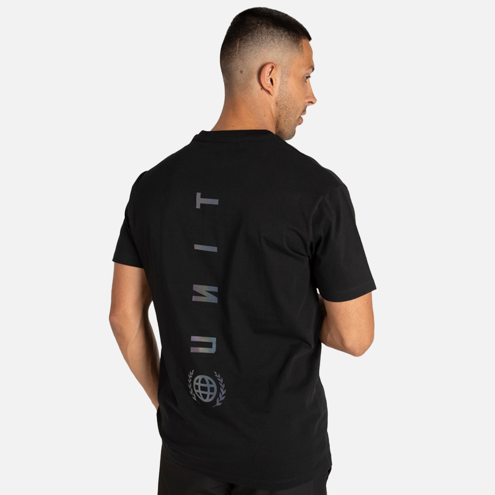 Man wearing a black t-shirt with unit branding on the back against a white background