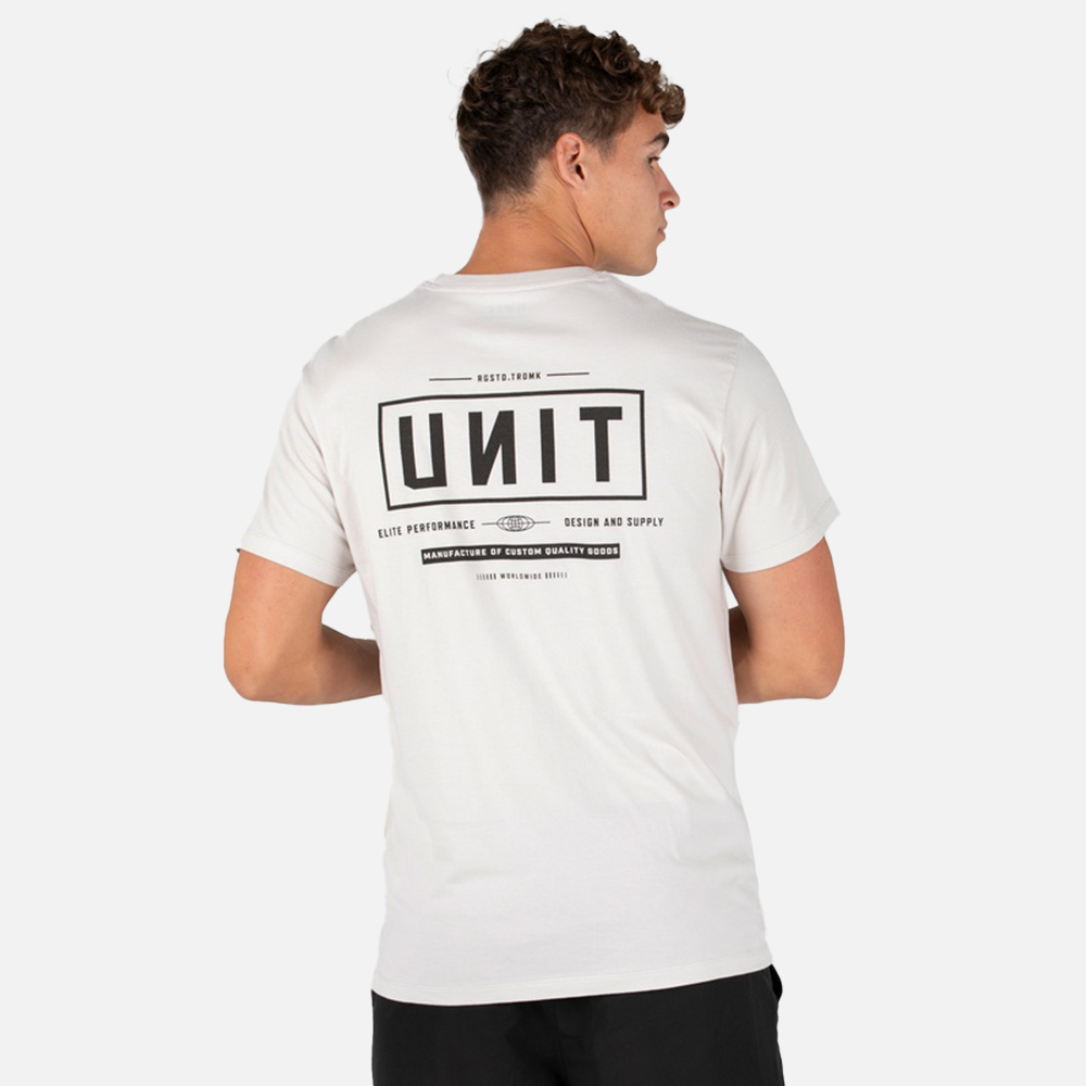 Person wearing a white t-shirt with 'UNIT' branding on the back, standing against a plain background.