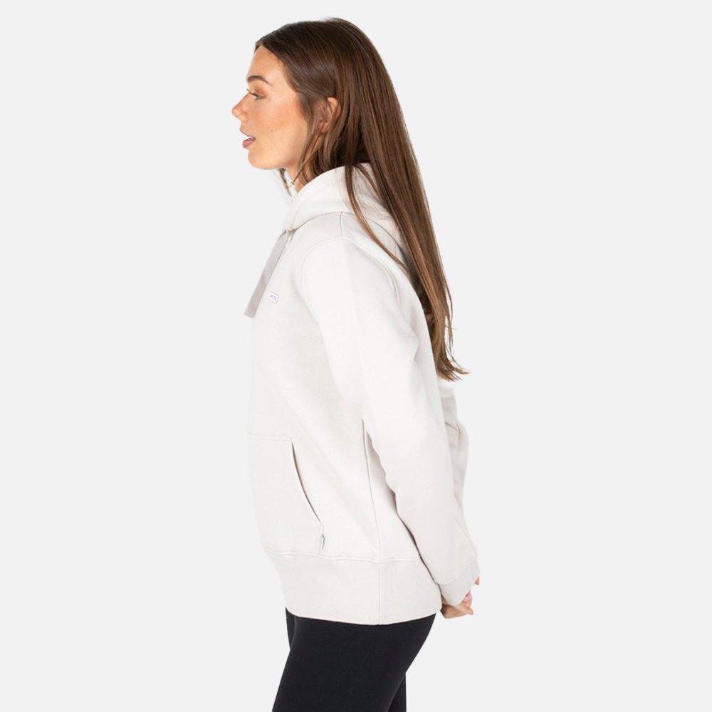 Woman wearing a white jacket on a white background