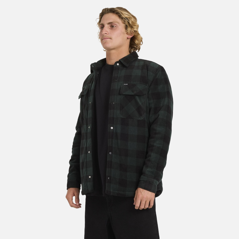 Man wearing a dark plaid shirt on a white background