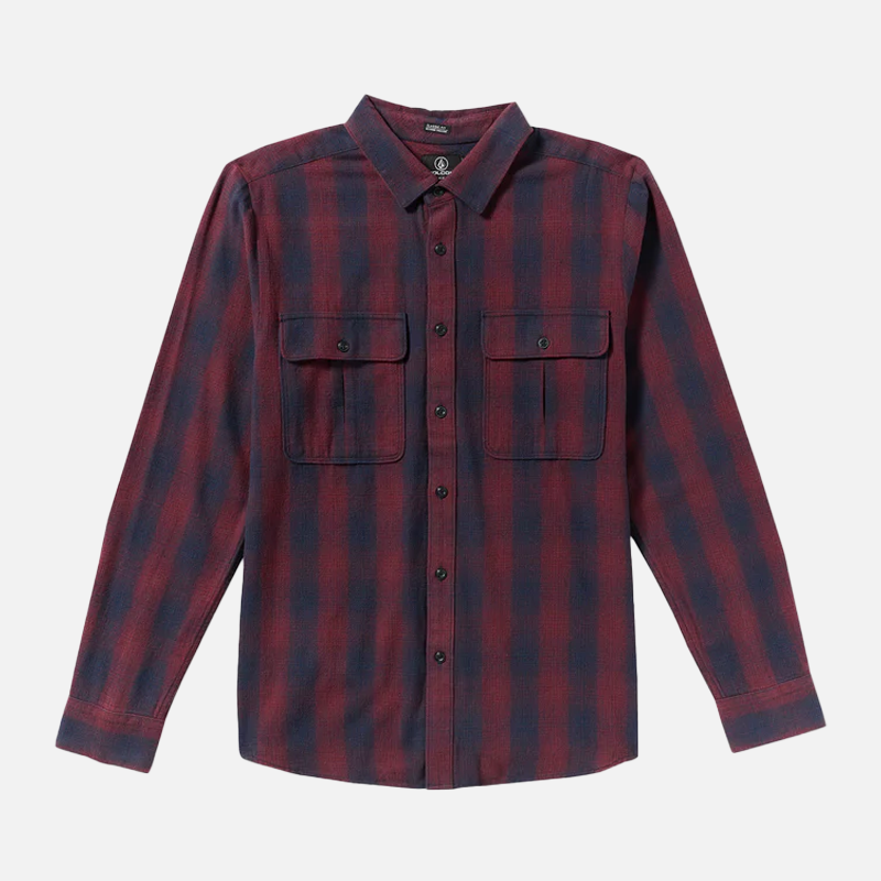 Red and blue plaid shirt on a light gray background