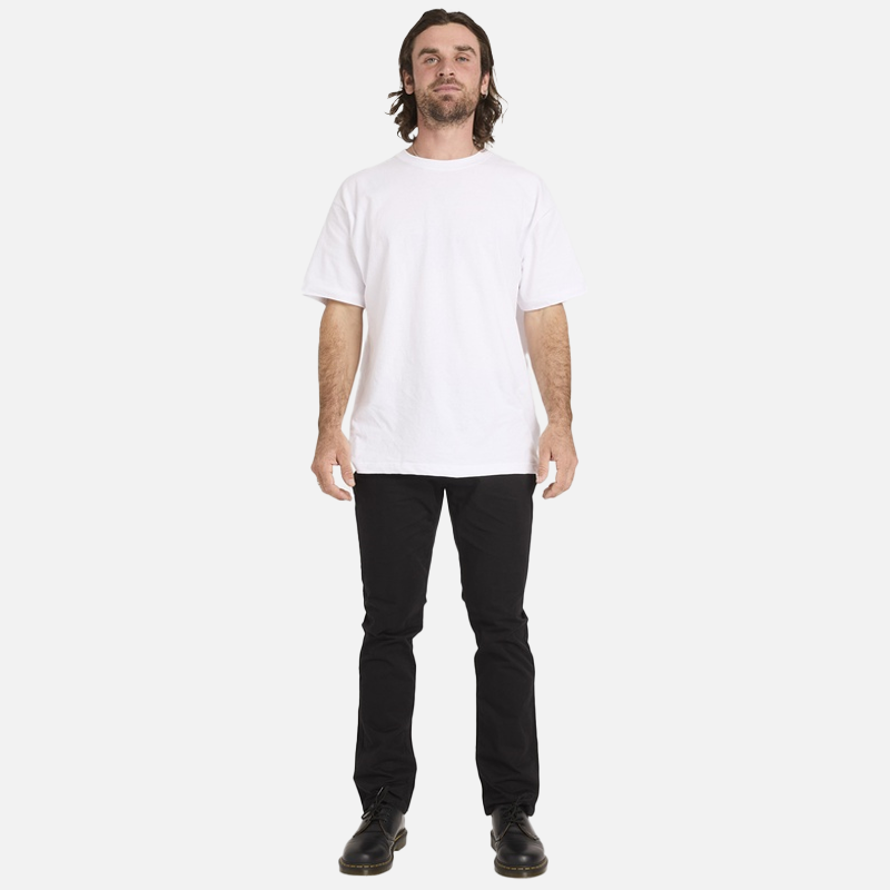 Man wearing a white t-shirt and black pants on a white background