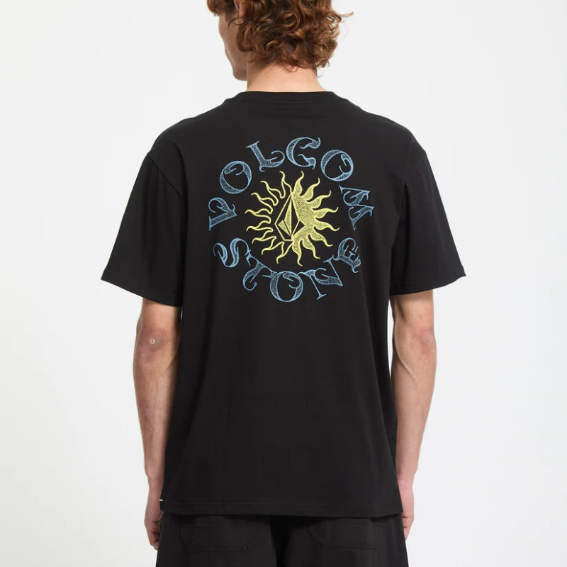 Person wearing a black t-shirt with a logo on the back against a white background