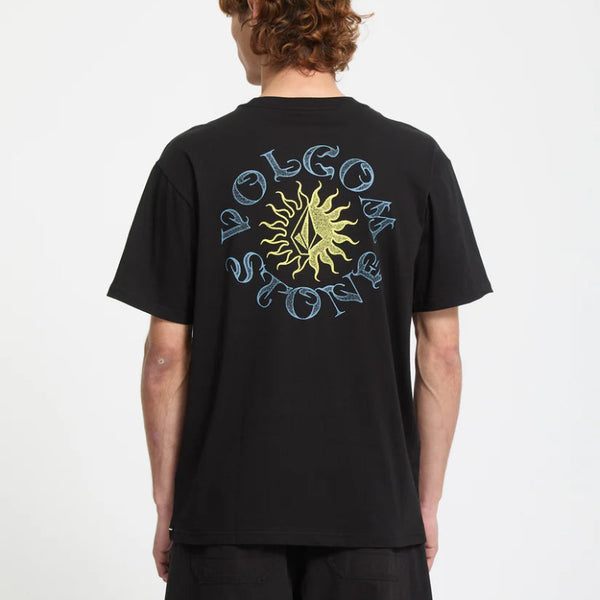 Person wearing a black t-shirt with a logo on the back against a white background