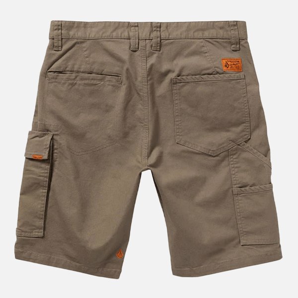 a tan pear of shorts with a orange logo 